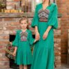 Rochiță de horă pentru fetițe din pânză topită verde cu jacquard etnic țesut 8-11 ani - IIANA